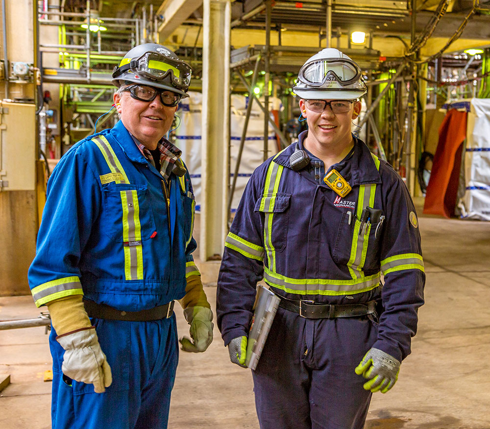 Two Lorneville Workers with Safety Goggles