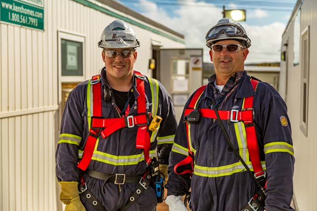 Men In Safety Gear Smiling